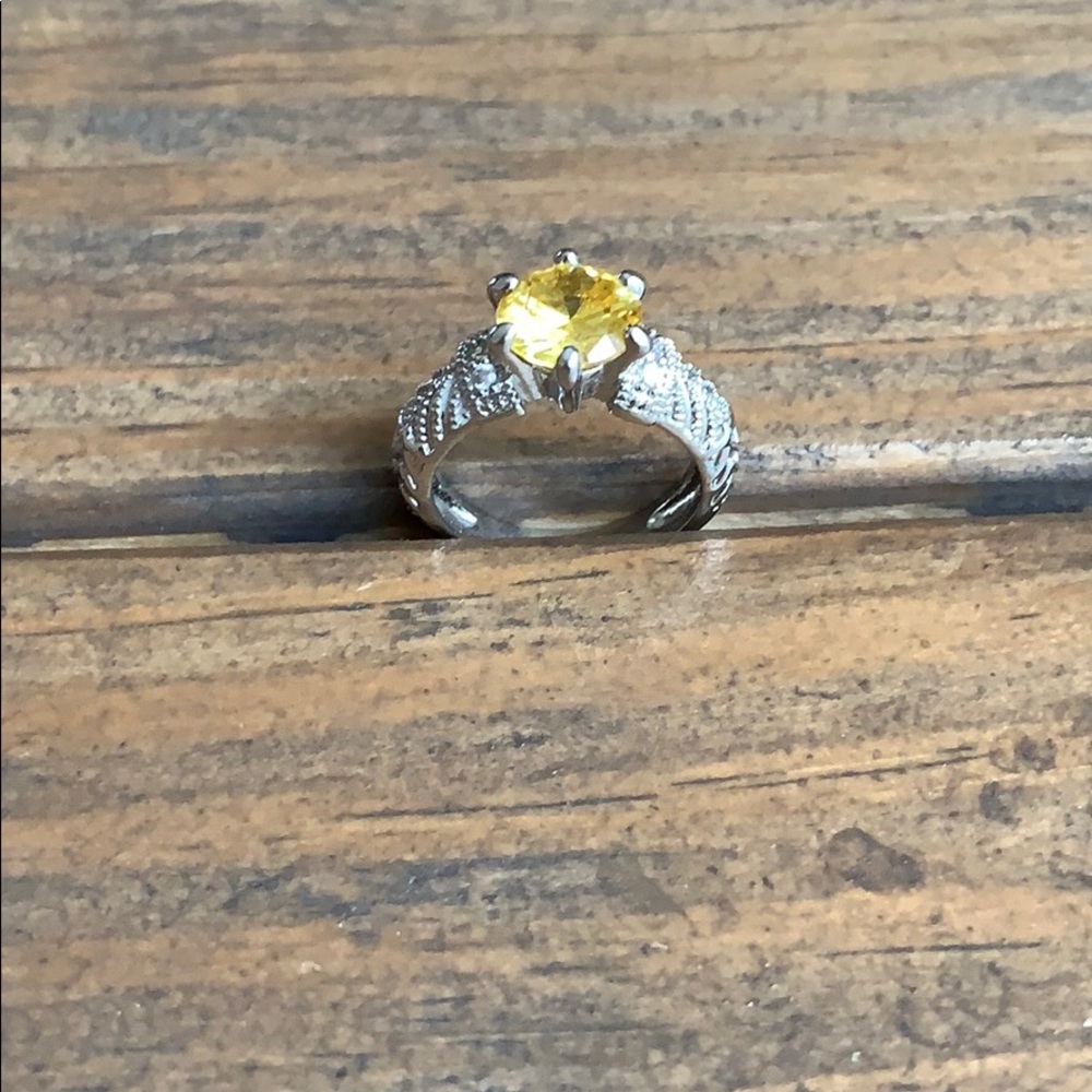 Ring with yellow stone